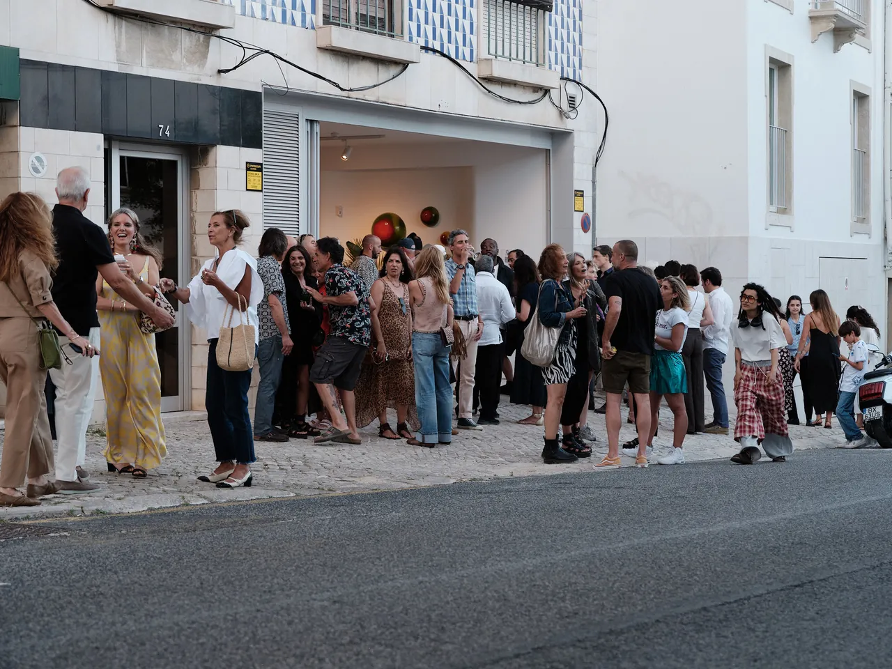 Guests outside Estrela 74 on Rua Santo António à Estrela, Lisbon